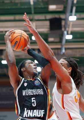 f l r Marcus Carr Fitness First Wuerzburg Baskets, 5 and Frederick Gillespie Galatasaray MCT Technic, 33 , 04 11 2025, Basketball, Champions League, Fitness First Wuerzburg Baskets Galatasaray MCT Technic, GER, Wuerzburg, tectake ARENA, Copyright: HMBxMedia xHeikoxBecker
