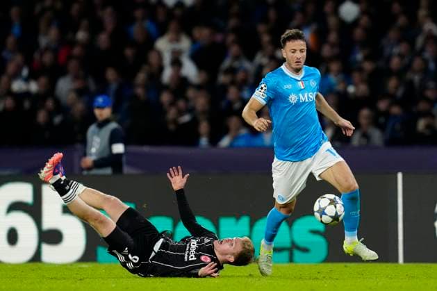 Jonathan Burkardt (Eintracht Frankfurt) and Amir Rrahmani (SSC Napoli) battle for the ball, UEFA Champions League 2025 26 League Phase MD4, SSC Napoli v Eintracht Frankfurt, Diego Armando Maradona Stadium, November 4, 2025, Naples, Italy.
