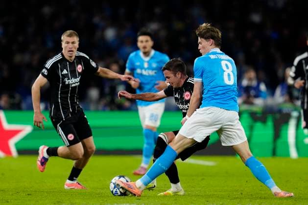 Mario Gotze (Eintracht Frankfurt) and Scott McTominay (SSC Napoli) battle for the ball, UEFA Champions League 2025 26 League Phase MD4, SSC Napoli v Eintracht Frankfurt, Diego Armando Maradona Stadium, November 4, 2025, Naples, Italy.