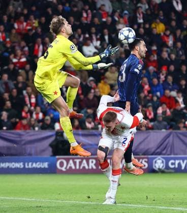 Mikel Merino of Arsenal scores his sides third goal past Jakub Markovic of Slavia Prague Slavia Prague v Arsenal, UEFA Champions League, Group Stage, Football, Fortuna Arena, Prague, Czechia - 04 Nov 2025Prague Fortuna Arena Czech Republic EDITORIAL USE ONLY No use with unauthorised audio, video, data, fixture lists, club league logos or live services. Online in-match use limited to 120 images, no video emulation. No use in betting, games or single club league player publications. Copyright: xMichaelxZemanek Shutterstockx 15642030am