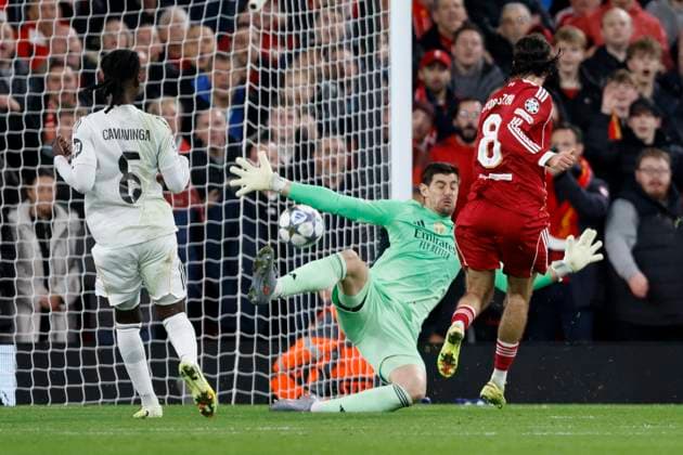 Liverpool FC v Real Madrid C.F. - UEFA Champions League 2025 26 League Phase MD4 Thibaut Courtois, goalkeeper of Real Madrid CF saves from Dominik Szoboszlai of Liverpool during the UEFA Champions League 2025 26 League Phase MD4 match between Liverpool FC and Real Madrid C.F. at Anfield on November 4, 2025 in Liverpool, England. Liverpool Anfield England United Kingdom Copyright: xRichardxSellers Sportsphoto APLx 14140316