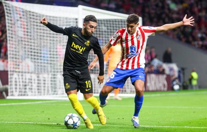 Union s Anouar Ait El Hadj and Atletico Madrid s Nahuel Molina fight for the ball during a soccer game between Spanish soccer team Atletico Madrid and Belgian Royale Union Saint-Gilloise, Tuesday 04 November 2025 in Madrid, on the fourth day of the League phase of the UEFA Champions League tournament. VIRGINIExLEFOUR  x139024025x