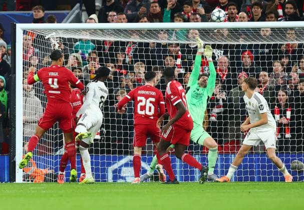 Thibaut Courtois of Real Madrid saves from Virgil van Dijk of Liverpool Liverpool v Real Madrid, UEFA Champions League, Group Stage, Football, Anfield, Liverpool, UK - 04 Nov 2025Liverpool Anfield United Kingdom EDITORIAL USE ONLY No use with unauthorised audio, video, data, fixture lists, club league logos or live services. Online in-match use limited to 120 images, no video emulation. No use in betting, games or single club league player publications. Copyright: xPaulxCurrie Shutterstockx 15642053bz