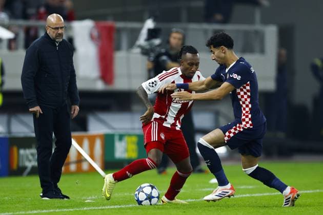 PIRAEUS - (L-R) Gelson Martins of Olympiacos FC, Anass Salah-Eddine of PSV Eindhoven during the UEFA Champions League match between Olympiacos FC and PSV Eindhoven at the Georgios Karaiskakis Stadium on November 4, 2025, in Piraeus, Greece. ANP MAURICE VAN STEEN UEFA Champions League Matchday 4 2025-2026 xVIxANPxSportx xxANPxIVx 541241804 originalFilename: 541241804.jpg