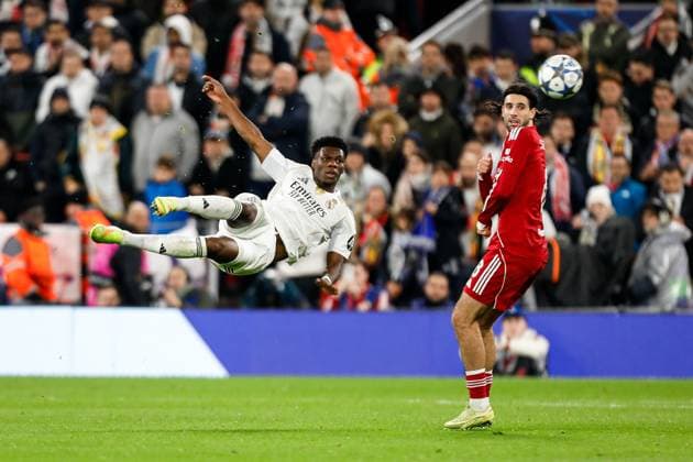 Liverpool v Real Madrid UEFA Champions League Dominik Szoboszlai of Liverpool and AurÃ lien TchouamÃ ni of Real Madrid during the UEFA Champions League match at Anfield, Liverpool UK Newspapers OUT Copyright: xMaxxTomlinsonx FIL-22464-0080