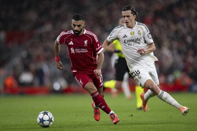 LIVERPOOL, ENGLAND - NOVEMBER 01: Mohamed Salah of Liverpool and Álvaro Carreras of Real Madrid in action during the UEFA Champions League match between Liverpool and Real Madrid at Anfield on November 04, 2025 in Liverpool, England. (Photo by Will Palmer Agencia LOF SPP) Copyright: xWillxPalmer AgenciaxLOF SPPx Sportspressphoto_SPR56919