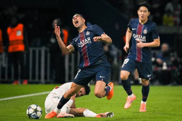 Champions League PSG vs FC Bayern Munich - FA Paris Saint-Germain’s defender Achraf Hakimi is tackled during the UEFA Champions League football match between Paris Saint-Germain and FC Bayern Munich at the Parc des Princes Stadium in Paris on November 4, 2025. Photo by Firas Abdullah ABACAPRESS.COM Paris Ile-de-France France  Copyright: xAbdullahxFiras ABACAx