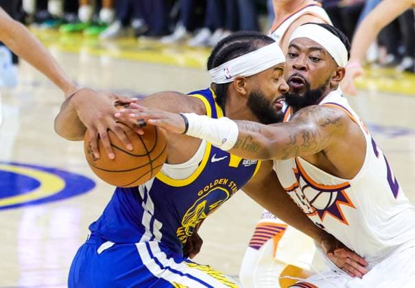 (251105) -- SAN FRANCISCO, Nov. 5, 2025 -- Moses Moody of Golden State Warriors vies for the ball during the 2025-2026 NBA, Basketball Herren, USA regular season match between Phoenix Suns and Golden State Warriors in San Francisco, the United States, on Nov. 4, 2025. (Photo by Xinhua) (SP)U.S.-SAN FRANCISCO-BASKETBALL-NBA-SUNS VS WARRIORS DongxXudong 