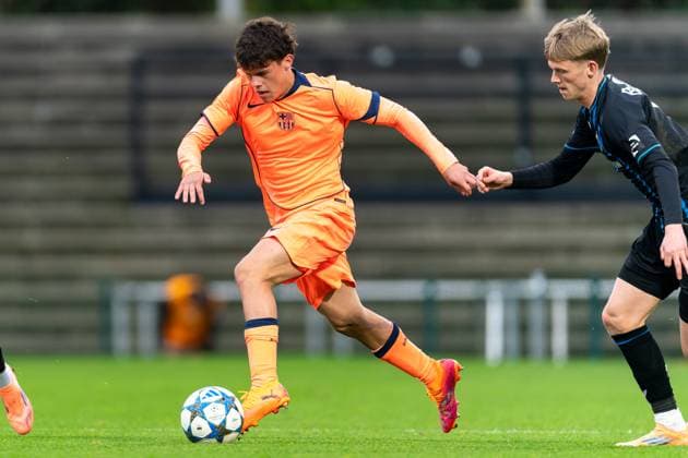 2025-11-05 Club Brugge KV v FC Barcelona, Barca - UEFA Youth League 2025 26 ROESELARE, BELGIUM - NOVEMBER 5: Pol Bernabeu of FC Barcelona battles for the ball with Tobias Lund Jensen of Club Brugge during the UEFA Youth League 2025 26 match between Club Brugge KV and FC Barcelona at The NEST on November 5, 2025 in Roeselare, Belgium. Roeselare The NEST Belgium Content not available for redistribution in The Netherlands directly or indirectly through any third parties. Copyright: xJorisxVerwijstx