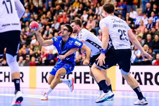 TVB Stuttgart SG Flensburg Handewitt Handball DHB Pokal, Men, Season 2025 2026, TVB Stuttgart SG Flensburg Handewitt, Scharrena Stuttgarts Antonio Serradilla l in action against Flensburgs Johannes Golla Stuttgart Scharrena Baden Württemberg Germany