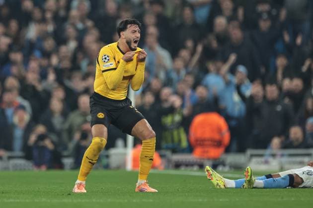 UEFA Champions League Matchday 4 of 8 Manchester City v Borussia Dortmund Ramy Bensebaini of Borussia Dortmund reacts after fouling Savinho during the UEFA Champions League Matchday 4 of 8 Manchester City vs Borussia Dortmund at the City of Manchester Stadium, Manchester, United Kingdom, 5th November 2025 (Photo by Mark Cosgrove News Images) Manchester City of Manchester Stadium Manchester United, ManU Kingdom Copyright: xMarkxCosgrove NewsxImagesx