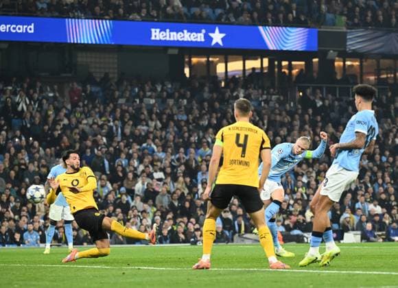 Manchester, England, 5th November 2025. Erling Haaland of Manchester City scoring the second goal during the Manchester City vs Borussia Dortmund UEFA Champions League match at the Etihad Stadium, Manchester. Picture credit should read: Cody Froggatt Sportimage EDITORIAL USE ONLY. No use with unauthorised audio, video, data, fixture lists, club league logos or live services. Online in-match use limited to 120 images, no video emulation. No use in betting, games or single club league player publications. SPI_027_CF_Man_City_Dortmund SPI-4268-0051