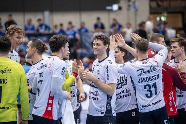 Niclas Kirkelokke SG Flensburg Handewitt, 05 with team, happy about working victory in Stuttgart GER, TVB Stuttgart SG Flensburg Handewitt, DAIKIN HBL, Handball, Bundesliga, DHB Pokal Round of 16, Season 2025 2026, 05 11 2025 GER, TVB Stuttgart SG Flensburg Handewitt, DAIKIN HBL, Handball, Bundesliga, DHB Pokal Round of 16, Season 2025 2026, 05 11 2025 Stuttgart Copyright: xSandyxDinkelackerx EP_SDR