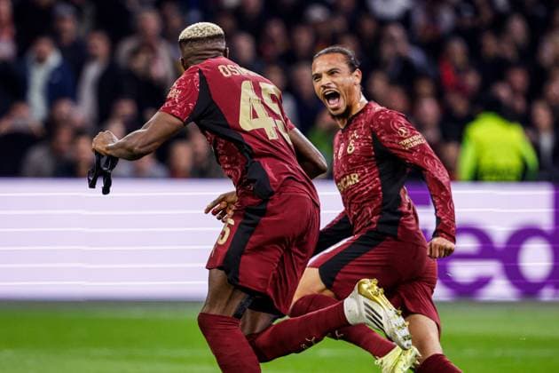 2025-11-05 Ajax v Galatasaray AS - UEFA Champions League 2025 26 League Phase MD4 AMSTERDAM, NETHERLANDS - NOVEMBER 5: Victor Osimhen of Galatasaray AS, Leroy Sane of Galatasaray AS celebrate the second goal during the UEFA Champions League 2025 26 League Phase MD4 match between Ajax and Galatasaray AS at Johan Cruijff ArenA on November 5, 2025 in Amsterdam, Netherlands. Amsterdam Johan Cruijff ArenA Netherlands Content not available for redistribution in The Netherlands directly or indirectly through any third parties. Copyright: xBroerxvanxdenxBoomx