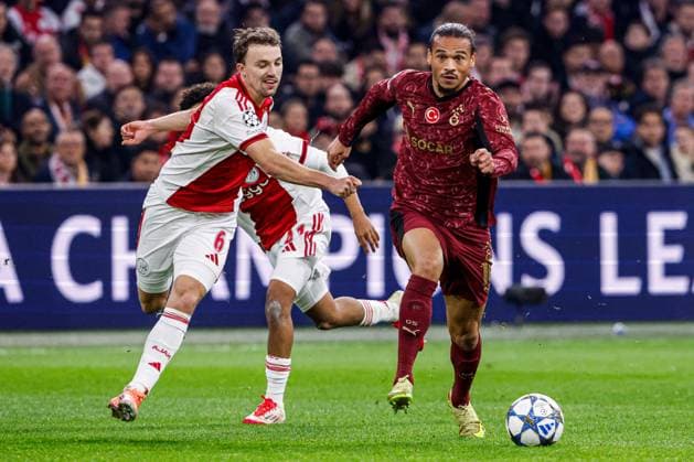 2025-11-05 Ajax v Galatasaray AS - UEFA Champions League 2025 26 League Phase MD4 AMSTERDAM, NETHERLANDS - NOVEMBER 5: Youri Regeer of AFC Ajax, Leroy Sane of Galatasaray AS battle for the ball during the UEFA Champions League 2025 26 League Phase MD4 match between Ajax and Galatasaray AS at Johan Cruijff ArenA on November 5, 2025 in Amsterdam, Netherlands. Amsterdam Johan Cruijff ArenA Netherlands Content not available for redistribution in The Netherlands directly or indirectly through any third parties. Copyright: xBroerxvanxdenxBoomx