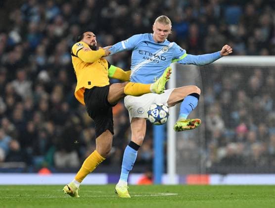 Manchester, England, 5th November 2025. Emre Can of Borussia Dortmund tussles with Erling Haaland of Manchester City during the Manchester City vs Borussia Dortmund UEFA Champions League match at the Etihad Stadium, Manchester. Picture credit should read: Cody Froggatt Sportimage EDITORIAL USE ONLY. No use with unauthorised audio, video, data, fixture lists, club league logos or live services. Online in-match use limited to 120 images, no video emulation. No use in betting, games or single club league player publications. SPI_051_CF_Man_City_Dortmund SPI-4268-0086