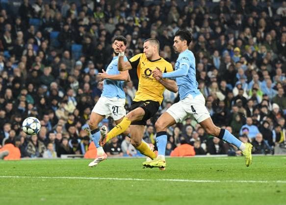 Manchester, England, 5th November 2025. Waldemar Anton of Borussia Dortmund scores their first goal (3-1) during the Manchester City vs Borussia Dortmund UEFA Champions League match at the Etihad Stadium, Manchester. Picture credit should read: Cody Froggatt Sportimage EDITORIAL USE ONLY. No use with unauthorised audio, video, data, fixture lists, club league logos or live services. Online in-match use limited to 120 images, no video emulation. No use in betting, games or single club league player publications. SPI_054_CF_Man_City_Dortmund SPI-4268-0091