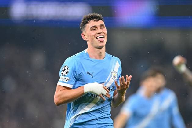 Phil Foden (Manchester City) celebrates after scoring his team s third goal during the UEFA Champions League 2025 26 League Phase MD4 match between Manchester City and Borussia Dortmund at City of Manchester Stadium on November 5, 2025 in Manchester, United Kingdom. (Photo by Harry Langer DeFodi Images) Phil Foden Manchester City celebrates after scoring his team s third goal during the UEFA Champions League 2025 26 League Phase MD4 match between Manchester City and Borussia Dortmund at City of Manchester Stadium on November 5, 2025 in Manchester, United Kingdom Photo by Harry Langer DeFodi Images