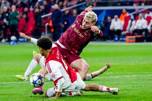 Baris Alper Yilmaz of Galatasaray and Gerald Alders of AFC Ajax battle for the ball AFC Ajax v Galatasaray A.S., UEFA Champions League 2025 26 League Phase MD4, AFC Ajax v Galatasaray A.S., Johan Cruijff ArenA, November 5, 2025, Amsterdam, Netherlands.