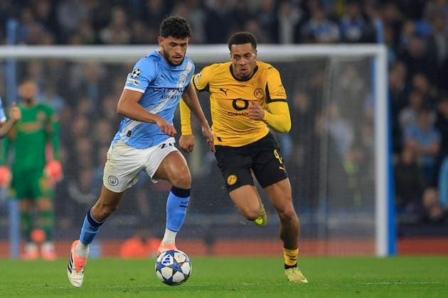 Manchester City v Borussia Dortmund Champions League 05 11 2025. Matheus Nunes (27) of Manchester City runs with the ball chased by Felix Nmecha (8) of Borussia Dortmund during the Champions League match between Manchester City and Borussia Dortmund at the Etihad Stadium, Manchester, England on 5 November 2025. Manchester Etihad Stadium Manchester England Editorial use only , Copyright: xConorxMolloyx PSI-23168-0076
