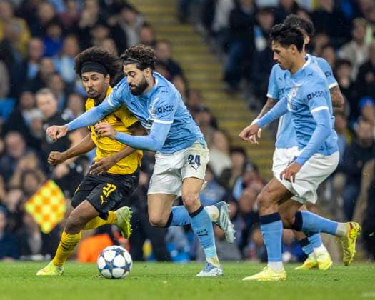 5th November 2025; Etihad Stadium, Manchester, England; UEFA Champions League Football, Manchester City versus Borussia Dortmund; Karim Adeyemi of Borussia Dortmund under pressure from Josko Gvardiol of Manchester City  TimxWilliams