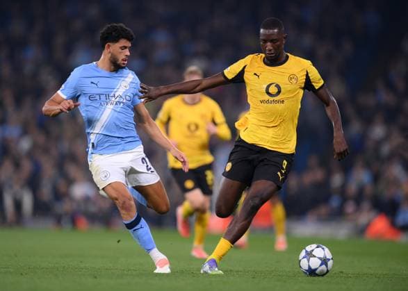 MANCHESTER, ENGLAND - NOVEMBER 5: Manchester City s Matheus Nunes and Dortmund s Serhou Guirassy in action during the UEFA Champions League 2025 26 League Phase MD4 match between Manchester City and Borussia Dortmund at City of Manchester Stadium on November 5, 2025 in Manchester, England. SPO 