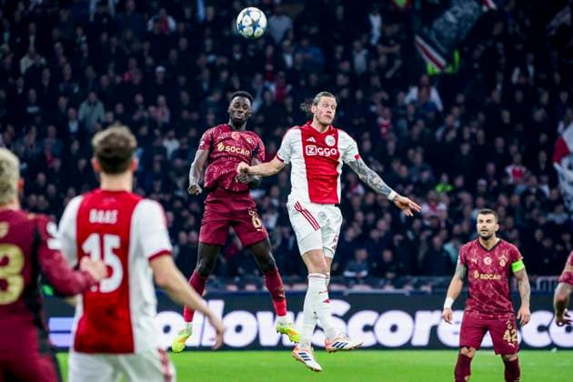 Davinson Sanchez of Galatasaray and Wout Weghorst of AFC Ajax compete for the headed ball AFC Ajax v Galatasaray A.S., UEFA Champions League 2025 26 League Phase MD4, AFC Ajax v Galatasaray A.S., Johan Cruijff ArenA, November 5, 2025, Amsterdam, Netherlands.