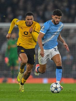 Manchester City v Borussia Dortmund UEFA Champions League Matheus Nunes of Manchester City and Felix Nmecha of Borussia Dortmund during the UEFA Champions League match at the Etihad Stadium, Manchester UK Newspapers OUT Copyright: xKarlxVallantinex FIL-22465-0099