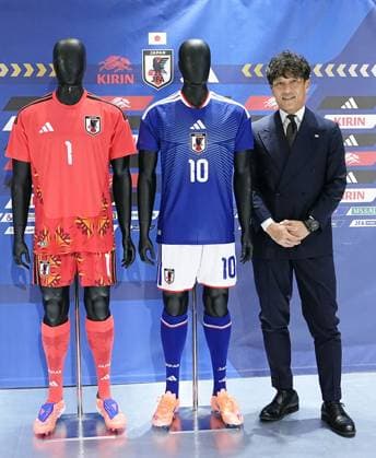 Football: Japan jerseys for 2026 World Cup Japan Football Association President Tsuneyasu Miyamoto poses in front of the press in Tokyo on Nov. 6, 2025, as the organization unveils the national team, Nationalteam s home jerseys for outfield players (blue) and goalkeepers to be worn at the 2026 World Cup in Canada, Mexico and the United States. The Samurai Blue will wear the new jerseys from a Nov. 14 friendly against Ghana.  A14AA0005010943P