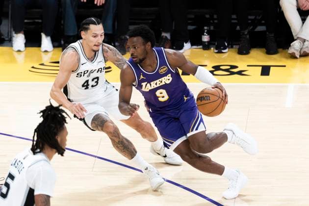 November 5, 2025, Los Angeles, California, USA: Los Angeles LakersÃ¢â‚¬â ¢ Bronny James (9) drives against San Antonio SpursÃ¢â‚¬â ¢ Lindy Waters III (43) during an NBA, Basketball Herren, USA basketball game, in Los Angeles Wednesday, Nov. 5, 2025. Los Angeles USA - ZUMAc68_ 20251105_zaf_c68_033 Copyright: xRingoxChiux