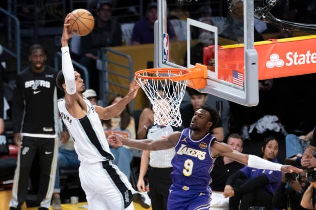 November 5, 2025, Los Angeles, California, USA: San Antonio SpursÃ¢â‚¬â ¢ Victor Wembanyama (1) goes to the basket against Los Angeles LakersÃ¢â‚¬â ¢ Bronny James (9) during an NBA, Basketball Herren, USA basketball game, in Los Angeles Wednesday, Nov. 5, 2025. Los Angeles USA - ZUMAc68_ 20251105_zaf_c68_051 Copyright: xRingoxChiux