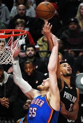 (251106) -- PORTLAND, Nov. 6, 2025 -- Toumani Camara (R) of Portland Trail Blazers vies against Isaiah Hartenstein of Oklahoma City Thunders during the 2025-2026 NBA, Basketball Herren, USA regular season match between Portland Trail Blazers and Oklahoma City Thunders in Portland, the United States, Nov. 5, 2025. ) (SP)U.S.-PORTLAND-BASKETBALL-NBA-TRAIL BLAZERS VS THUNDERS WuxXiaoling 