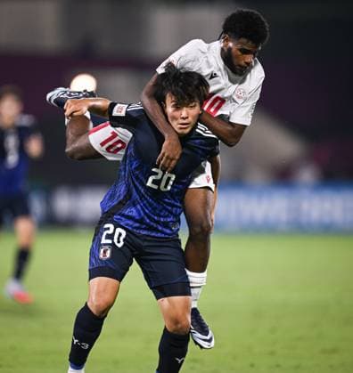 Football, Junior U 17 World Cup 2025 in Doha Qatar Preliminary Round 06 11 2025 Group B Japan New Caledonia Taiga Seguchi bottom, Japan v Ezekie Wamowe top, New Caledonia
