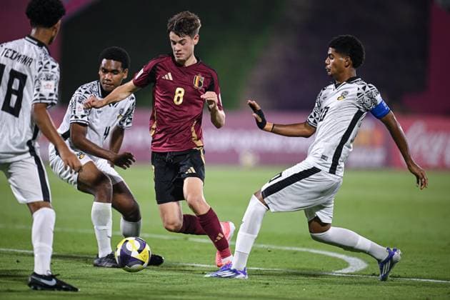 Football, Junior U 17 World Cup 2025 in Doha Qatar Preliminary Round 06 11 2025 Group D Belgium Fiji Four-goal scorer Rene Mitongo center, Belgium against Ravuso Sukabula left, Fiji and Siales Vatanatawake 2 v left, Fiji