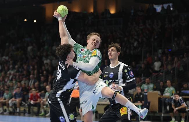 Tillman Leu, Tobias Schjoelberg Groendahl on the ball, Moritz Ende duel Game scene Action Sport Handball DHB Cup Round of 16 Men Season 2025 2026 06 11 2025 Füchse Berlin vs ThSV Eisenach