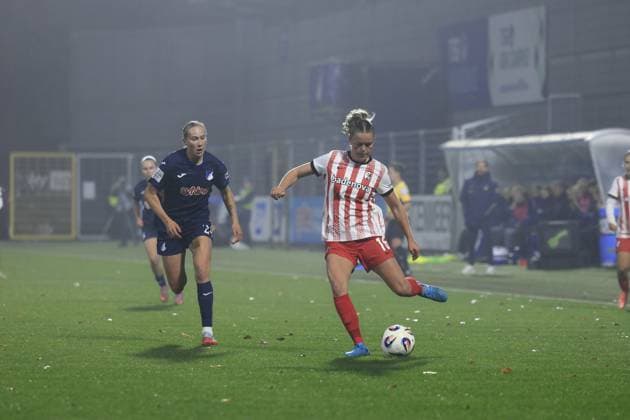 Feli Delacauw 24 TSG Hoffenheim Women with ball while Greta Stegemann 16 SC Freiburg Women defends GPFBL TSG Hoffenheim vs SC Freiburg on 06 11 2025 at Dietmar Hopp Stadion in Hoffenheim Players in action Copyright: xspeedshotx