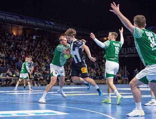 Handball, Men, Season 2025 2026, DHB Cup Round of 16, Füchse Berlin ThSV Eisenach, f l Max Darj Füchse Berlin , Felix Aellen Eisenach , Mathias Gidsel Füchse Berlin , Hakun West Av Teigum Füchse Berlin , 06 11 2025, Copyright: xSebastianxRäppold MatthiasxKochx