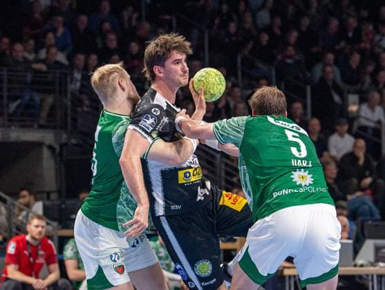 Handball, Men, Season 2025 2026, DHB Cup Round of 16 , Füchse Berlin ThSV Eisenach, f l Matthes Langhoff Füchse Berlin , Stephan Seitz Eisenach , Max Darj Füchse Berlin , 06 11 2025, Copyright: xSebastianxRäppold MatthiasxKochx