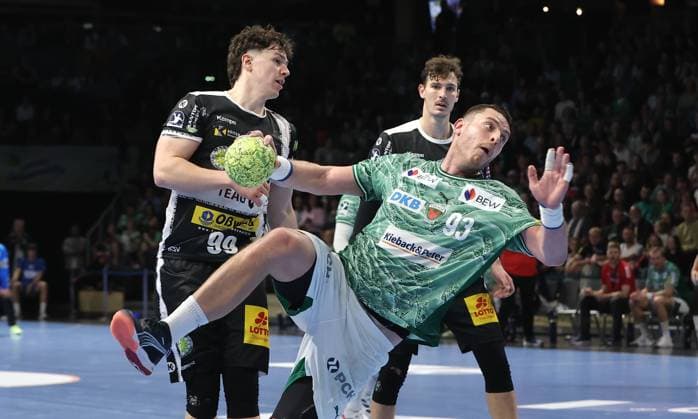 Mijajlo Marsenic scores a goal duel Match scene Action Sport Handball DHB Pokal Round of 16 Men Season 2025 2026 06 11 2025 Füchse Berlin vs ThSV Eisenach