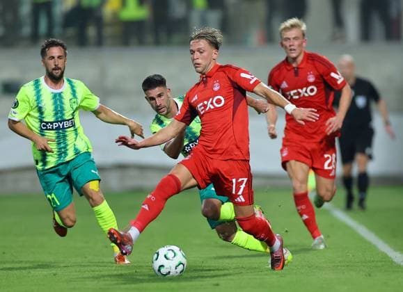 Jorge Miramon of AEK Larnaca in action against Jesper Karlsson of Aberdeen (centre), Alexander Jensen of Aberdeen AEK Larnaca v Aberdeen, UEFA Conference League, Group Stage, Football, AEK Arena, Larnaca, Cyprus - 06 Nov 2025Larnaca AEK Arena Cyprus EDITORIAL USE ONLY No use with unauthorised audio, video, data, fixture lists, club league logos or live services. Online in-match use limited to 120 images, no video emulation. No use in betting, games or single club league player publications. Copyright: xCharaxSavvides Shutterstockx 15642241cb