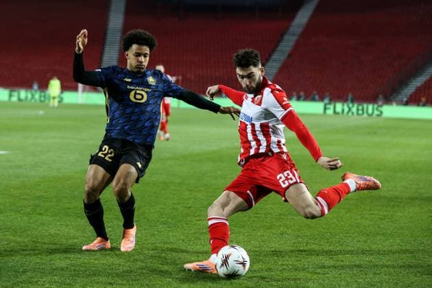 Crvena Zvezda v Lille - UEFA Europa League BELGRADE, SERBIA - NOVEMBER 06: Nair Tiknizyan (23) of Crvena Zvezda in action against Tiago Santos (22) of Lille during the UEFA Europa League football match between Crvena Zvezda and Lille at Rajko Mitic Stadium on November 6, 2025 in Belgrade, Serbia. Filip Stevanovic Anadolu Belgrade Serbia. Editorial use only. Please get in touch for any other usage.  Copyright: x2025xAnadoluxFilipxStevanovicx