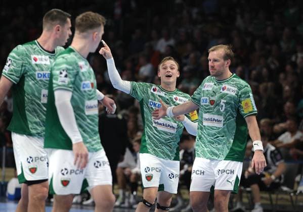 Mijajlo Marsenic, Lasse Andersson, Tobias Schjoelberg Groendahl showing, Max Darj action upper body Sport Handball DHB Pokal Round of 16 Men Season 2025 2026 06 11 2025 Füchse Berlin vs ThSV Eisenach