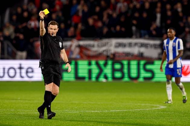 2025-11-06 FC Utrecht v FC Porto - UEFA Europa League 2025 26 League Phase MD4 UTRECHT, NETHERLANDS - NOVEMBER 6: Referee John Beaton shows yellow card during the UEFA Europa League 2025 26 League Phase MD4 match between FC Utrecht and FC Porto at Stadion Galgenwaard on November 6, 2025 in Utrecht, Netherlands. Utrecht Stadion Galgenwaard Netherlands Content not available for redistribution in The Netherlands directly or indirectly through any third parties. Copyright: xBenxGalx