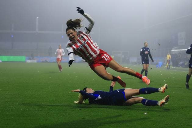 Leela Egli 20 SC Freiburg Women is brought down in a tackle by a TSG Hoffenheim Women player GPFBL TSG Hoffenheim vs SC Freiburg on 06 11 2025 at Dietmar Hopp Stadion in Hoffenheim Intense tackle during the match Copyright: xspeedshotx