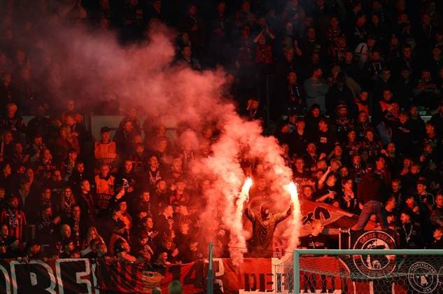 A fan of FC Midtjylland let off flares Midtjylland vs Celtic, UEFA Europa League, Group Stage, Football, MCH Arena, Herning, Denmark - 06 Nov 2025Herning MCH Arena Denmark EDITORIAL USE ONLY No use with unauthorised audio, video, data, fixture lists, club league logos or live services. Online in-match use limited to 120 images, no video emulation. No use in betting, games or single club league player publications.  Copyright: xMichaelxZemanek Shutterstockx 15642247bd