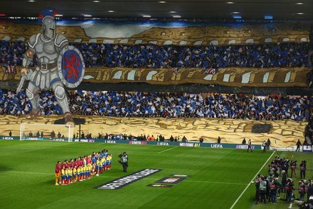 Rangers and Roma line up in front of the fans display during the Europa League league phase match at Ibrox Stadium, Glasgow. Rangers v Roma - UEFA Europa League - League Phase - Ibrox Stadium, Glasgow, Lanarkshire, Scotland, UK - 06 Nov 2025Glasgow Ibrox Lanarkshire United Kingdom  Copyright: xO Rourke RangersxFC Shutterstockx 15702164b
