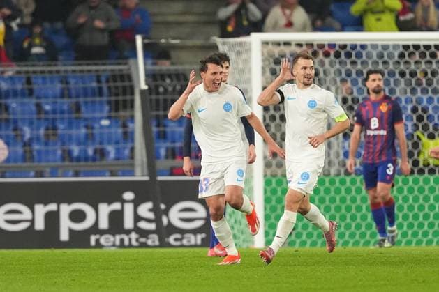 Switzerland UEFA Europa League 2025 26, FC Basel 1893 vs FCSB Bucharest St Jakob Park, Basel Darius Olaru 27 Bucharest celebrates after his goal with Risto Radunovic 33 Bucharest Basel St Jakob Park Basel Switzerland Copyright: xKjetilxWaberx