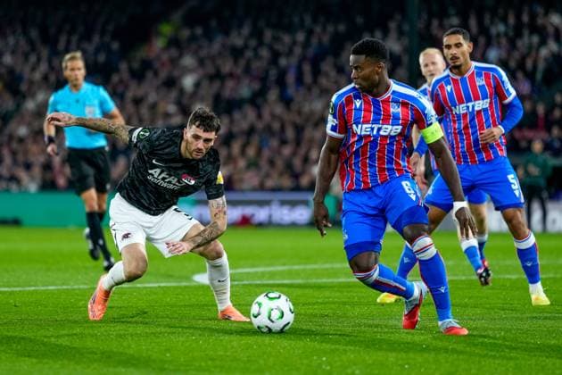 2025-11-06 Crystal Palace v AZ Alkmaar - UEFA Conference League 2025 26 League Phase MD4 LONDON, UNITED KINGDOM - NOVEMBER 6: Marc Guehi of Crystal Palace, Troy Parrott of AZ Alkmaar during the UEFA Conference League 2025 26 League Phase MD4 match between Crystal Palace and AZ Alkmaar at Selhurst Park Stadium on November 6, 2025 in London, United Kingdom. London Selhurst Park Stadium United Kingdom Content not available for redistribution in The Netherlands directly or indirectly through any third parties. Copyright: xEdxvanxdexPolx
