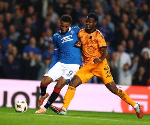 Youssef Chermiti of Rangers and Evan N Dicka of Roma during the Europa League league phase match at Ibrox Stadium, Glasgow. Rangers v Roma - UEFA Europa League - League Phase - Ibrox Stadium, Glasgow, Lanarkshire, Scotland, UK - 06 Nov 2025Glasgow Ibrox Lanarkshire United Kingdom  Copyright: xO Rourke RangersxFC Shutterstockx 15702164g