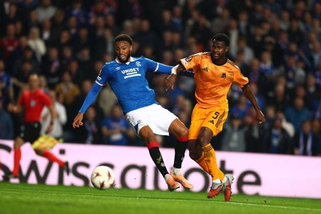 Evan N Dicka of Roma attempts to stop Youssef Chermiti of Rangers getting his shot at goal during the Europa League league phase match at Ibrox Stadium, Glasgow. Rangers v Roma - UEFA Europa League - League Phase - Ibrox Stadium, Glasgow, Lanarkshire, Scotland, UK - 06 Nov 2025Glasgow Ibrox Lanarkshire United Kingdom  Copyright: xO Rourke RangersxFC Shutterstockx 15702164j